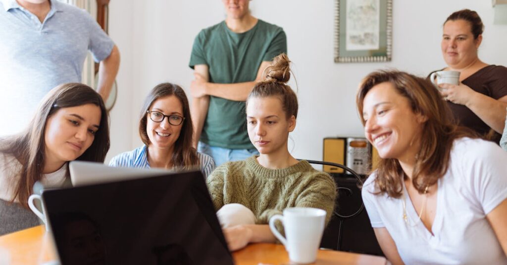 People Looking at Laptop Computer