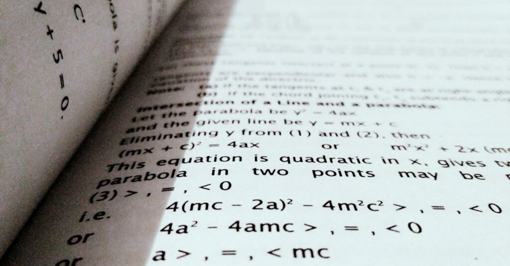 A close-up shot of mathematical equations on a book page, perfect for education and learning concepts.