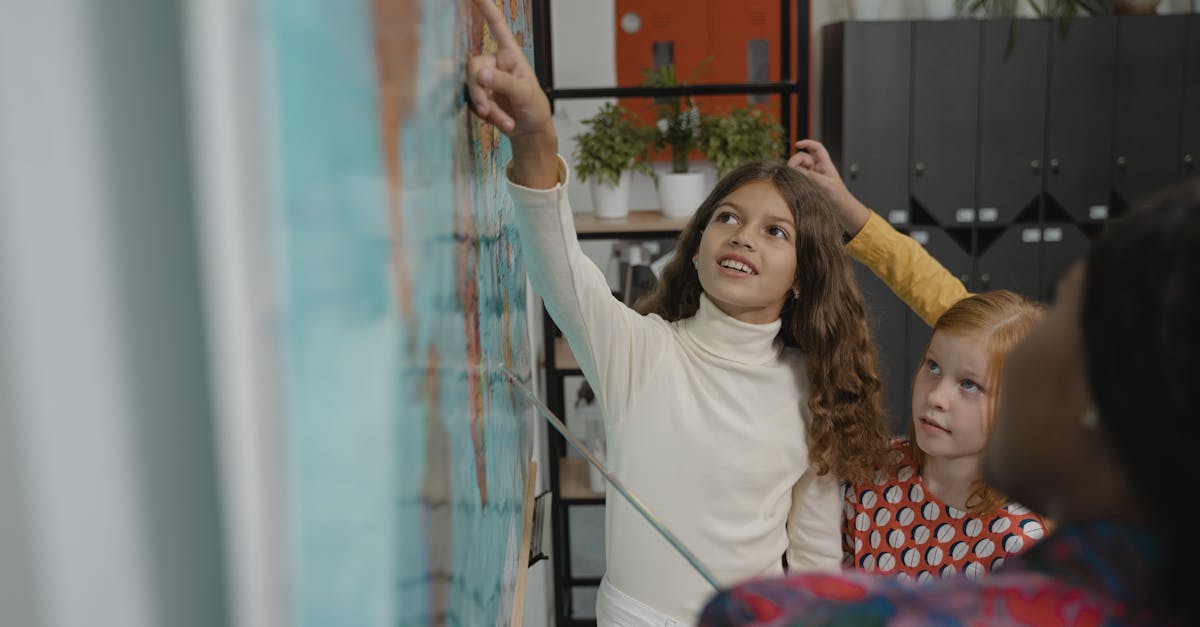 Children actively participate in a geography lesson in a school classroom.